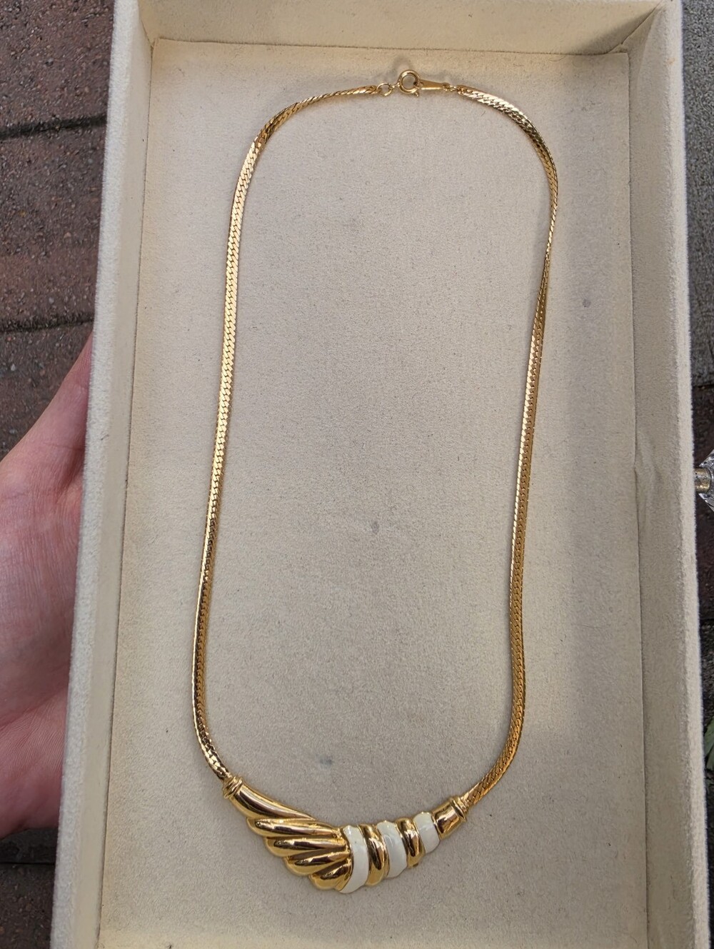 Avon Gold and White Sculpted Pendant Necklace